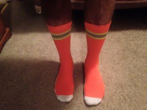 Louis models his SAR orange socks.